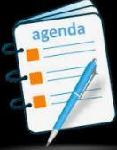 agenda notebook with pen.  black background